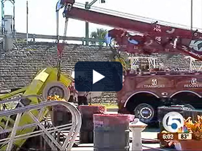 Forklift goes in water due to overweight boat